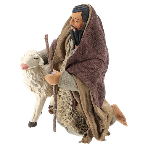 Pasterz arabski klęczący z owieczką 14 cm 3