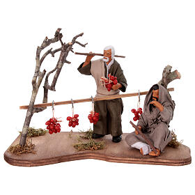 Miniature farmer with hanging tomatoes scene, 13 cm