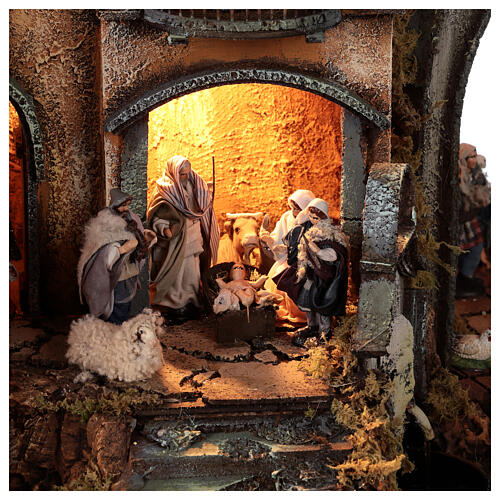 Neapolitan nativity village with bell tower church with animated figurines 8-10 cm 90x80x60 cm 2