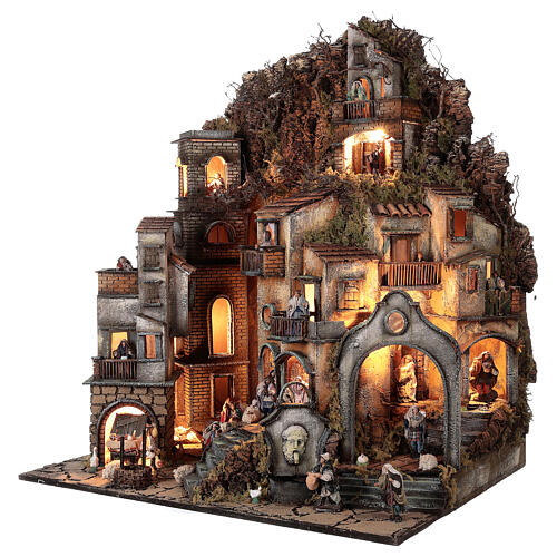 Neapolitan nativity village with bell tower church with animated figurines 8-10 cm 90x80x60 cm 3