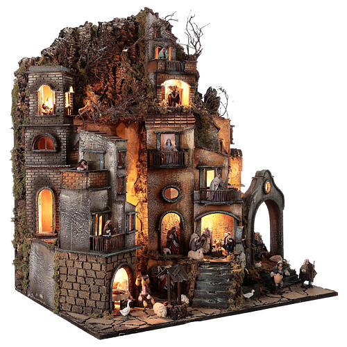 Neapolitan nativity village with bell tower church with animated figurines 8-10 cm 90x80x60 cm 5