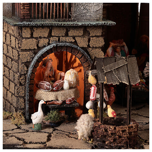 Neapolitan nativity village with bell tower church with animated figurines 8-10 cm 90x80x60 cm 8