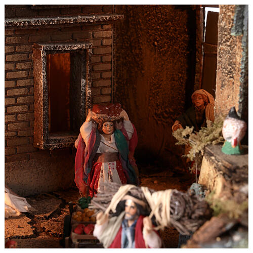 Neapolitan nativity village with bell tower church with animated figurines 8-10 cm 90x80x60 cm 9