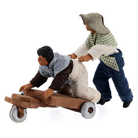 Pair of children playing with cart Neapolitan Nativity Scene figurine 10 cm