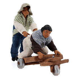 Pair of children playing with cart Neapolitan Nativity Scene figurine 10 cm