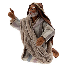 Uomo in ginocchio che indica presepe Napoli 10 cm