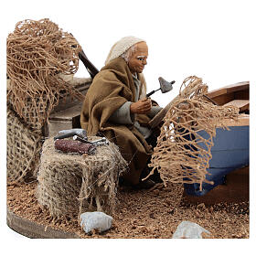 Man repairing boat, animated Neapolitan nativity 10 cm