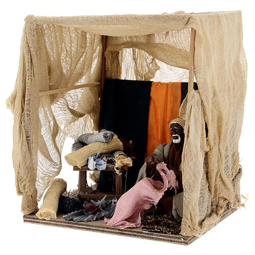 Scena ze sprzedawcą tkanin pod zasłoną, ruchoma figurka do szopki z Neapolu 14 cm 2