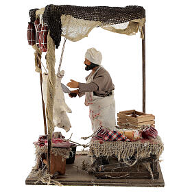 Animated working butcher Neapolitan Nativity Scene with standing figurines of 14 cm