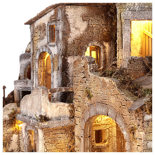 Wioska z fontaną i piecem, oświetlenie led, szopka 12 cm, wym. 55x70x42 cm 5