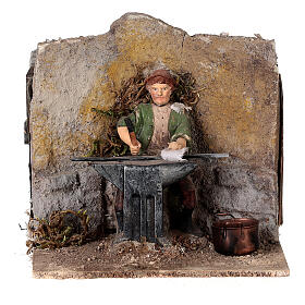 Estatua herrero belén 10 cm 3 movimientos 10x10x15 cm