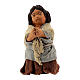 Girl praying on her knees for Neapolitan Nativity Scene with characters of 10 cm s1
