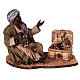 Moor man sitting with monkeys for Neapolitan Nativity Scene with characters of 30 cm s1