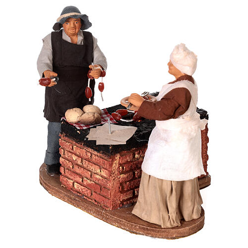 Animated couple grilling meat for Neapolitan Nativity Scene with characters of 14 cm 3