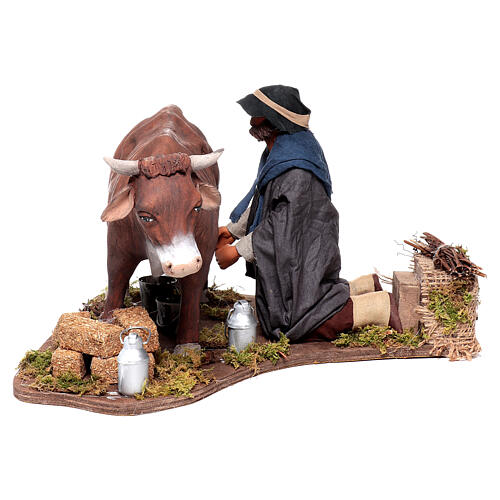 Man milking cow animated Neapolitan nativity scene 24 cm 1