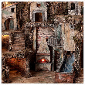 Neapolitan nativity village 55x70x50 cm with movement 16-18 cm