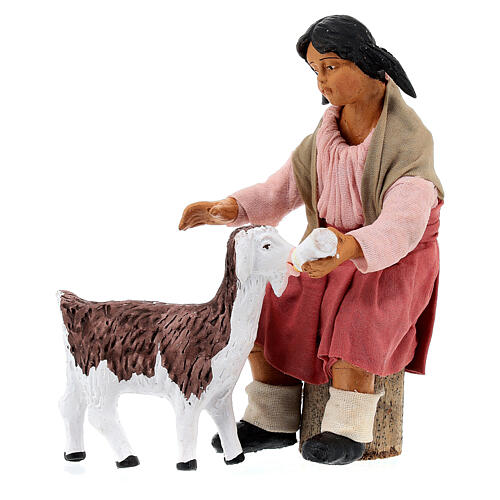 Young girl feeding a goatling for Neapolitan Nativity Scene with 24 cm characters 2