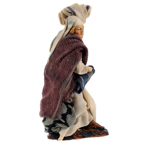 Man figurine with carpets for Neapolitan nativity scene 8 cm 3