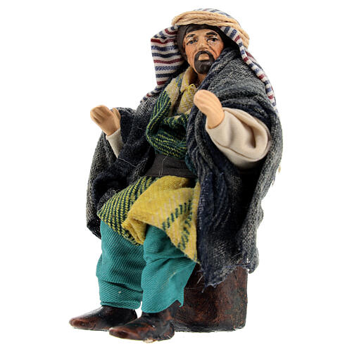 Old Arabic man sitting on a stone, figurine for Neapolitan Nativity Scene with 12 cm characters 2