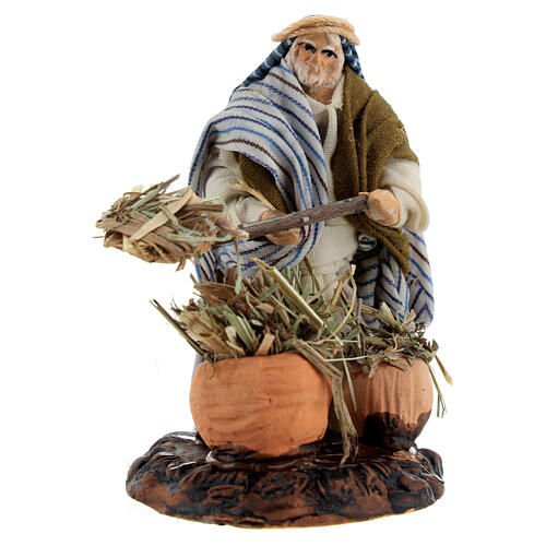 Campesino árabe con herramientas y heno para belenes de 6 cm 1