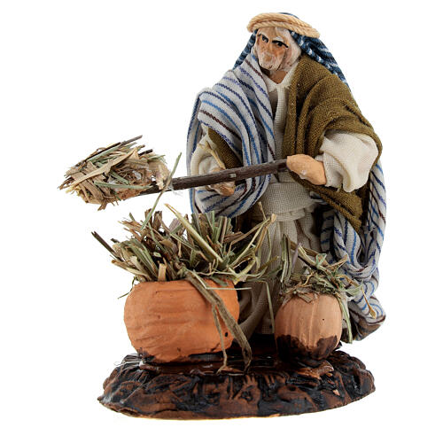 Campesino árabe con herramientas y heno para belenes de 6 cm 2