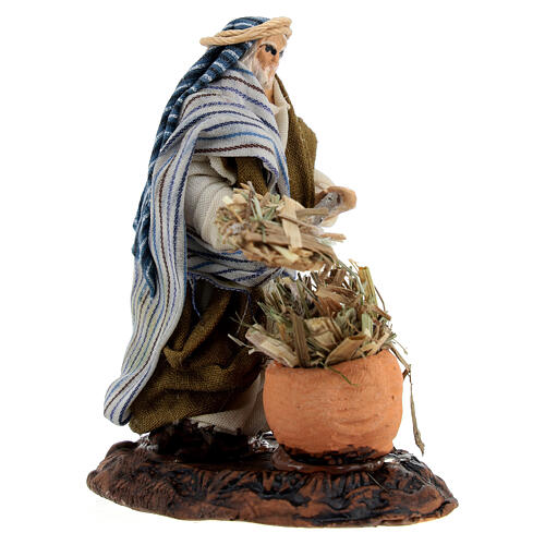 Campesino árabe con herramientas y heno para belenes de 6 cm 3