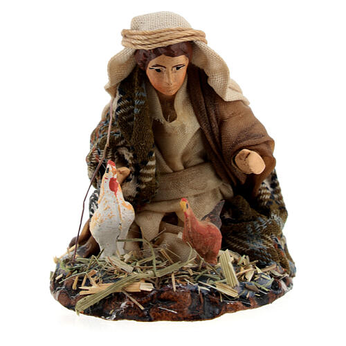 Giovane arabo con galline per presepi h.6 cm 1