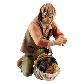 Kneeling shepherd with bread Original Pastore Nativity Scene in painted wood from Val Gardena 12 cm