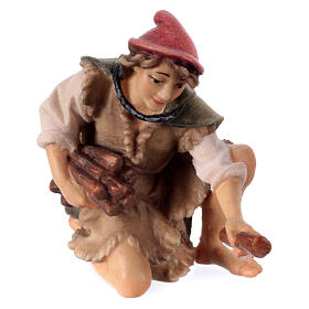 Sitting shepherd with wood Original Pastore Nativity Scene in painted wood from Valgardena 10 cm