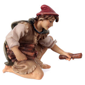 Sitting shepherd with wood Original Pastore Nativity Scene in painted wood from Valgardena 10 cm