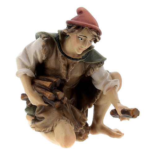 Sitting shepherd with wood Original Pastore Nativity Scene in painted wood from Valgardena 12 cm 1