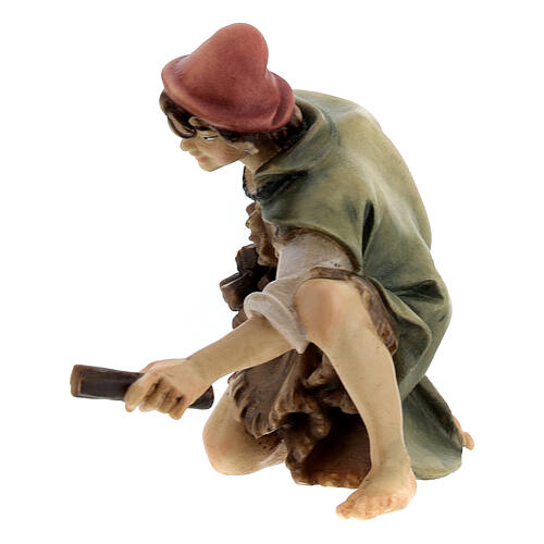 Sitting shepherd with wood Original Pastore Nativity Scene in painted wood from Valgardena 12 cm 2