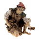 Sitting shepherd with wood Original Pastore Nativity Scene in painted wood from Valgardena 12 cm s1