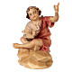 Child sitting at the bonfire Original Pastore Nativity Scene in painted wood from Valgardena 10 cm s1