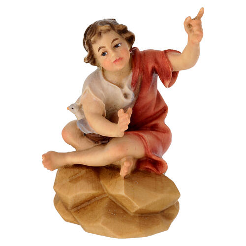 Enfant assis sur rocher pour crèche Original Berger bois peint Val Gardena de 12 cm 1