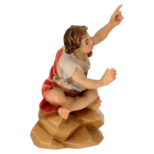 Enfant assis sur rocher pour crèche Original Berger bois peint Val Gardena de 12 cm 3