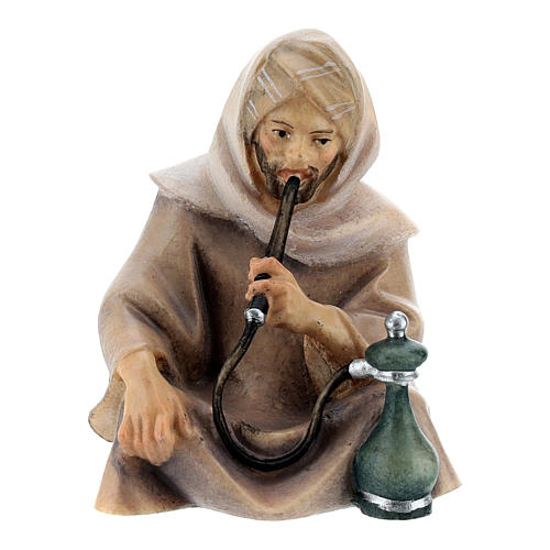 Sitting shepherd with water pipe Original Cometa Nativity Scene in painted wood from Valgardena 10 cm 1