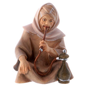 Sitting shepherd with water pipe Original Cometa Nativity Scene in painted wood from Valgardena 12 cm