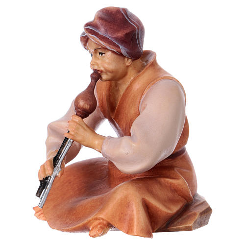 Sitting shepherd with flute Original Cometa Nativity Scene in painted wood from Valgardena 12 cm 2