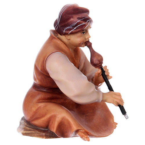 Sitting shepherd with flute Original Cometa Nativity Scene in painted wood from Valgardena 12 cm 3