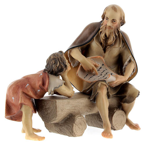 Old man on bench with child Original Nativity Scene in painted wood from Val Gardena 12 cm 2