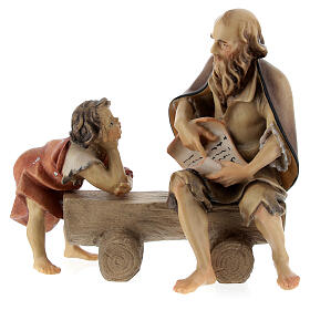 Anziano sulla panchina con bambino per presepe Original legno dipinto in Valgardena 12 cm