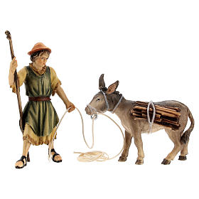 Shepherd pulling a donkey with timber Original Nativity Scene in painted wood from Val Gardena 10 cm