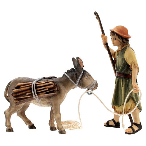 Shepherd pulling a donkey with timber Original Nativity Scene in painted wood from Val Gardena 10 cm 2