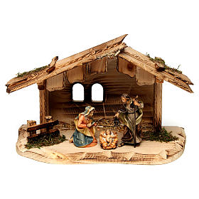 Sacra famiglia nella casa presepe Original legno dipinto in Valgardena 10 cm