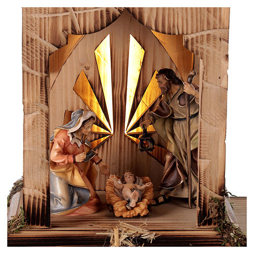Sagrada Familia con luz en la linterna belén Original madera pintada de Val Gardena de altura media 12 cm 5