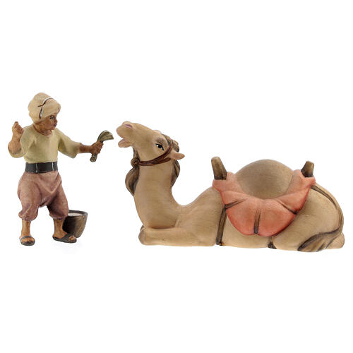 Jeune chamelier avec chameau allongé pour crèche Original Rédempteur bois peint Val Gardena 10 cm 1