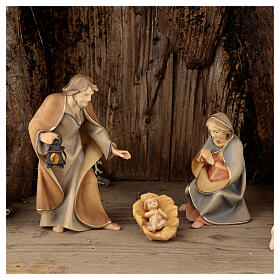 Holy Family with young shepherd in cave Original Redentore Nativity Scene in painted wood from Valgardena 12 cm - 6 pieces