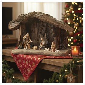 Holy Family with young shepherd in cave Original Redentore Nativity Scene in painted wood from Valgardena 12 cm - 6 pieces