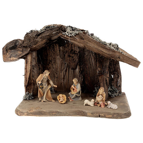 Holy Family with young shepherd in cave Original Redentore Nativity Scene in painted wood from Valgardena 12 cm - 6 pieces 1